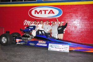 Tommy Plott Takes Home Some Cash From The Rock thanks to his dragster built by russ farmer and race tech